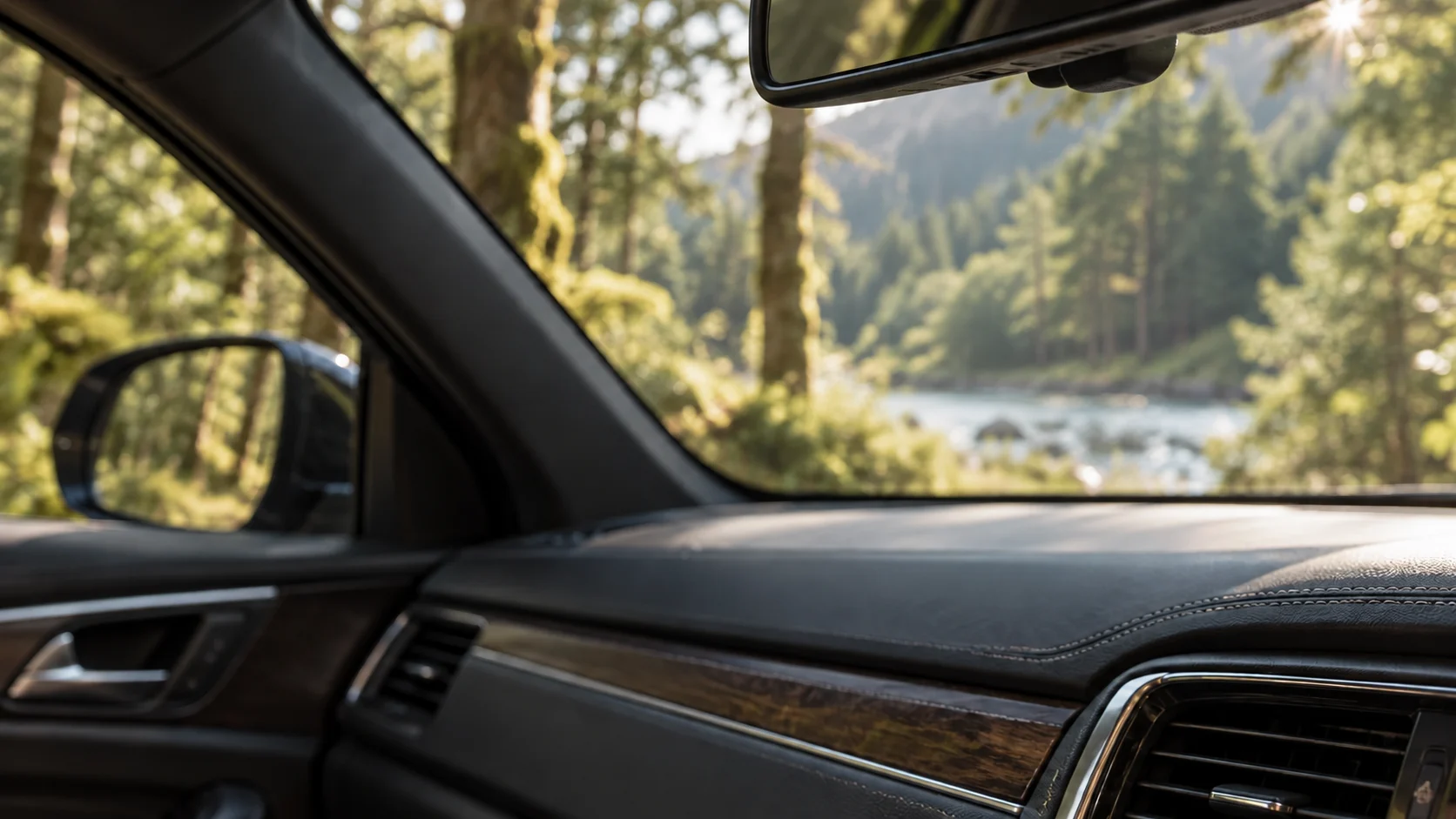 MXA Studio Viking Compass diffuser in black wood with a green insert, visualised hanging inside a car